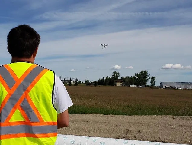 Photo of student operating DJI Phantom 4 for Flight Review Test