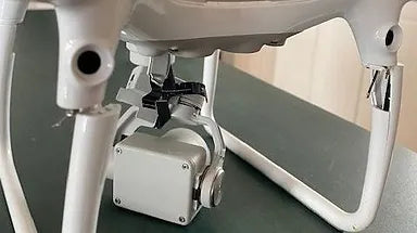 Photo of damaged gimble and leg on DJI Phantom 4