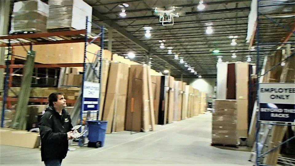 Photo of DJI Phantom 4 drone inside warehouse